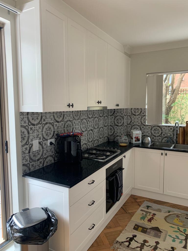 kitchen with black countertop