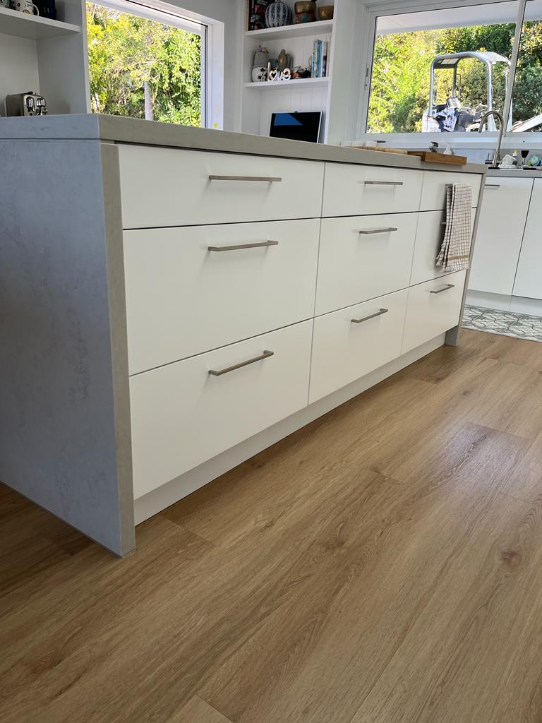 Side view of Grey Kitchen Island with Custom Cabinets